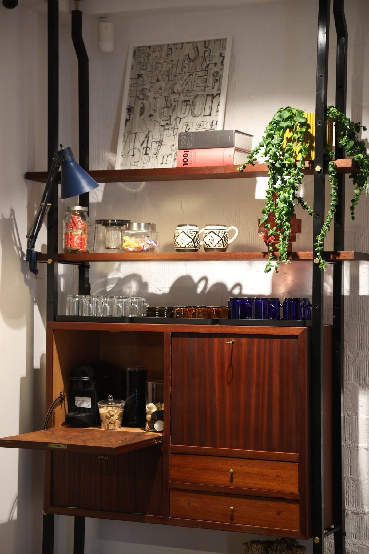 Coworking coffee corner with a vintage shelf